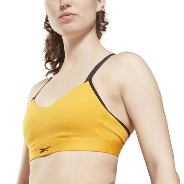 Жіночий бюстгальтер Reebok Lux Strappy W - semi solar gold ST78864 фото
