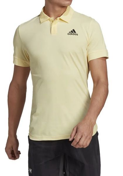 Чоловіче поло Adidas New York - майже жовте ST86625 фото